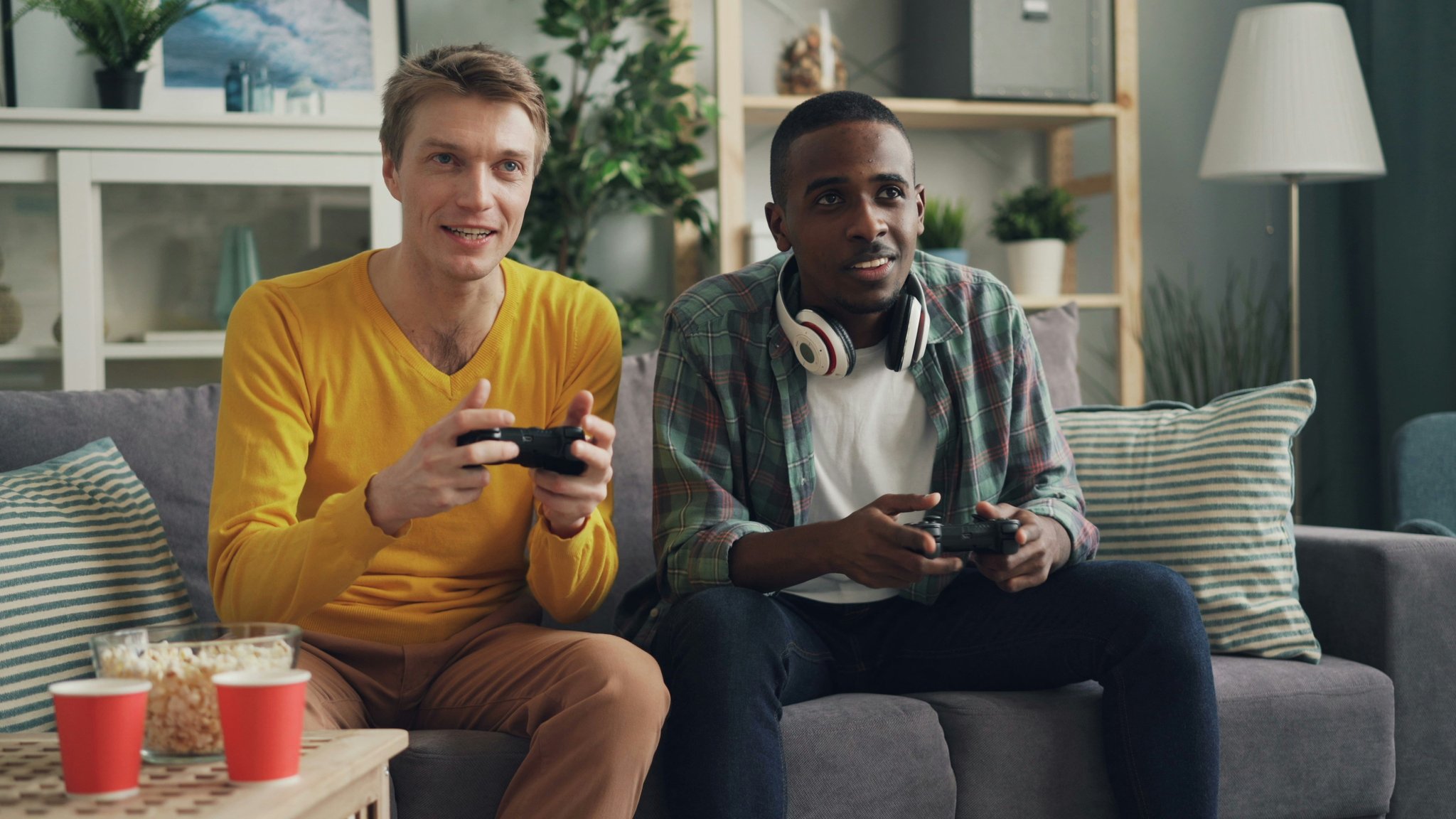 Three teammates planning strategy at spawn