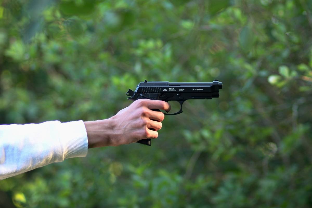 a person holding a gun